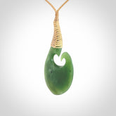 This koru is carved from a very striking New Zealand jade.
